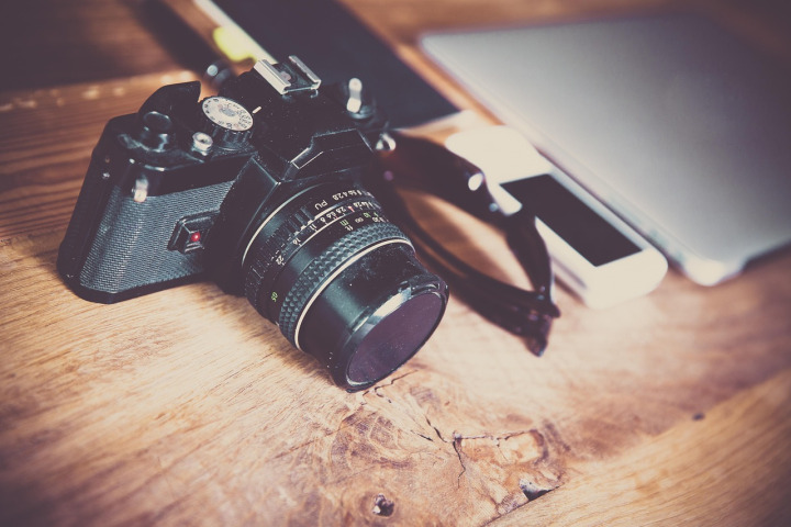 newsroom journalists camera